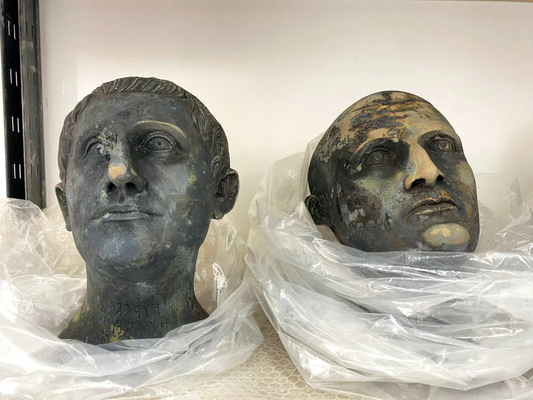 Two bronze busts
