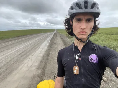 Liam Garner biking in Alaska, where he began his journey