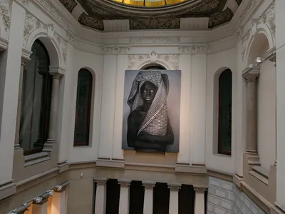 A print of a work by South African photographer Zanele Muholi hangs above the museum&#39;s staircase.