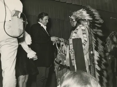 Cash receives an honor from a tribal elder.jpg