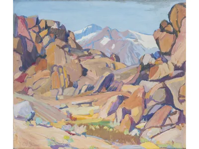 Rocks, an undated oil painting by Skinner, reflects the artist&#39;s penchant for juxtaposing the earthy tones of the Western desert with icy blue shadows and sky.&nbsp;